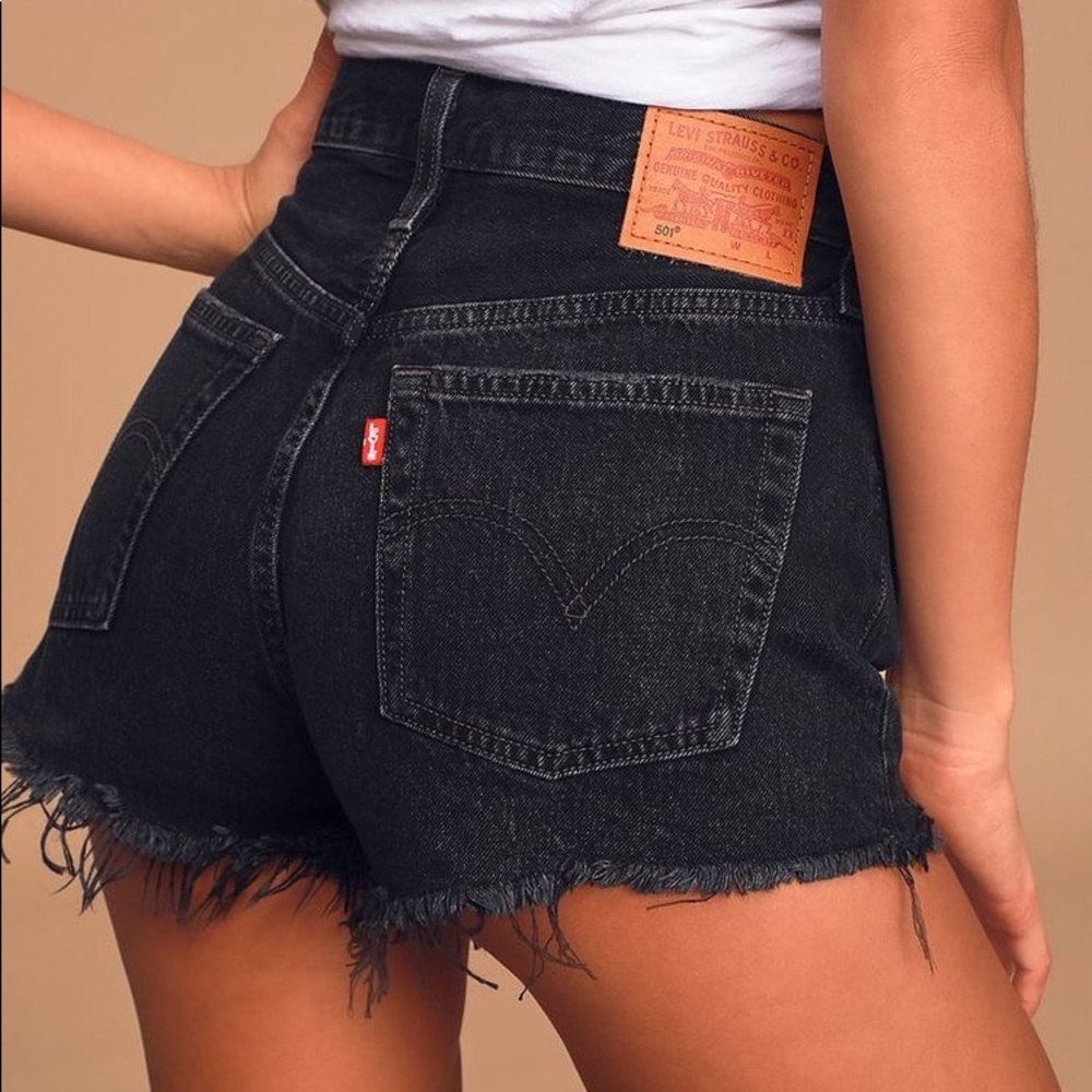 Levi’s 501 distressed black denim shorts